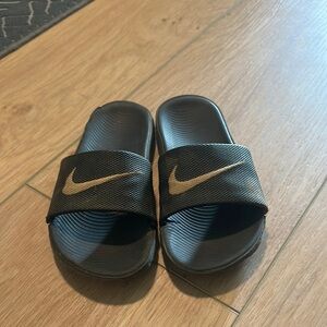 Nike Black and Gold Kids Sandals